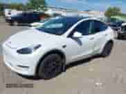 2023 Tesla Model Y Long Range with VIN 7SAYGDEE9PA033911, listed as a IAAI auction lot 43202182 with 35,938 mi miles and . Bid and sale history available at DreamBid. Image 2.
