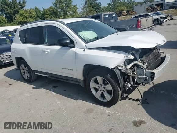 2014 Jeep Compass Sport с VIN 1C4NJCBB9ED587074, выставлен на аукционе Copart как лот 80352105 с пробегом 133 609 миль миль и Списание • Salvage title. История ставок и продаж доступна на DreamBid. Изображение 14.