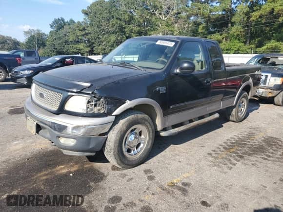 1999 Ford F-150 z VIN 1FTRX18W5XNC20636, wystawiony jako Copart lot #80905425 z przebiegiem Nie podano mil oraz Szkoda całkowita • Salvage title. Historia ofert i sprzedaży dostępna na DreamBid. Obrazek 1.