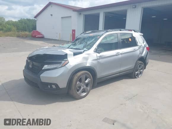 2019 Honda Passport Touring with VIN 5FNYF8H92KB011685, listed as a IAAI auction lot 43117835 with Not provided miles and . Bid and sale history available at DreamBid. Image 2.