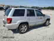2004 Jeep Grand Cherokee Overland с VIN 1J8GW68J54C271033, выставлен на аукционе Copart как лот 66160055 с пробегом 203 651 миль миль и Чистый • Clean title. История ставок и продаж доступна на DreamBid. Изображение 3.