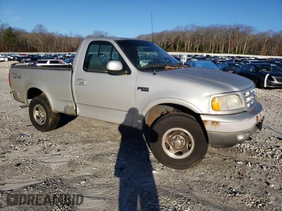 2002 Ford F-150 XL z VIN 1FTRF18212NA49764, wystawiony jako Copart lot #81626174 z przebiegiem Nie podano mil oraz Czysty tytuł • Clean title. Historia ofert i sprzedaży dostępna na DreamBid. Obrazek 4.