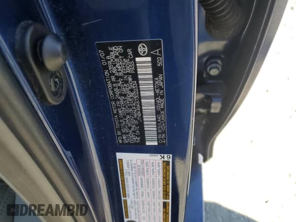 2007 Toyota Camry LE z VIN JTNBK46K673022334, wystawiony jako Copart lot #82340835 z przebiegiem 92 625 mil mil oraz Szkoda całkowita • Salvage title. Historia ofert i sprzedaży dostępna na DreamBid. Obrazek 13.