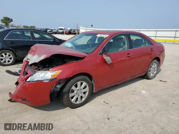 2007 Toyota Camry CE with VIN JTNBE46K573093788, listed as a Copart auction lot 71637015 with 221,932 mi miles and Salvage title. Bid and sale history available at DreamBid. Image 1.