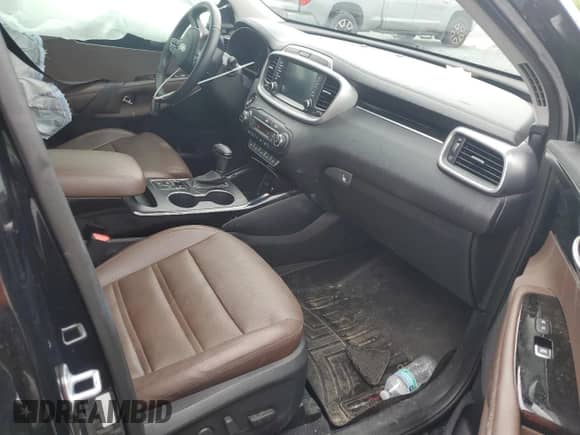 2019 Kia Sorento SX with VIN 5XYPK4A59KG452052, listed as a Copart auction lot 67530695 with 57,850 mi miles and Salvage title. Bid and sale history available at DreamBid. Image 8.