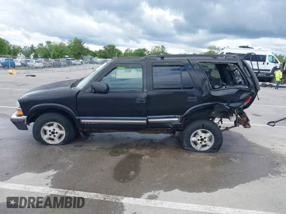 2000 Chevrolet Blazer LS with VIN 1GNDT13W2Y2297715, listed as a IAAI auction lot 42315268 with 198,508 mi miles and . Bid and sale history available at DreamBid. Image 14.
