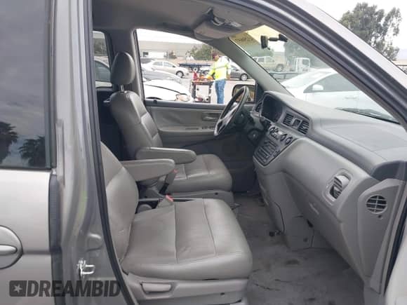 2000 Honda Odyssey EX z VIN 2HKRL1861YH618293, wystawiony jako IAAI lot #43250697 z przebiegiem 119 896 mil mil oraz . Historia ofert i sprzedaży dostępna na DreamBid. Obrazek 5.