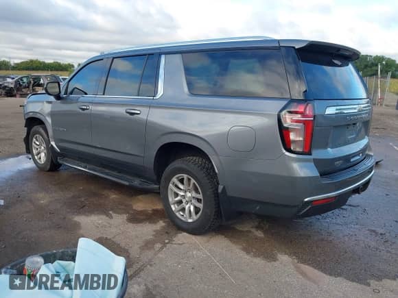 2021 Chevrolet Suburban LS z VIN 1GNSKBKD5MR448306, wystawiony jako IAAI lot #43157418 z przebiegiem 68 452 mil mil oraz . Historia ofert i sprzedaży dostępna na DreamBid. Obrazek 3.