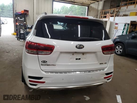 2016 Kia Sorento SXL z VIN 5XYPKDA50GG086151, wystawiony jako Copart lot #71834295 z przebiegiem 165 638 mil mil oraz Szkoda całkowita • Salvage title. Historia ofert i sprzedaży dostępna na DreamBid. Obrazek 6.