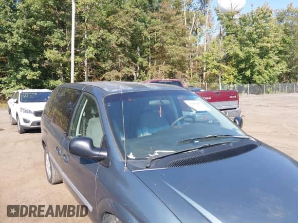 2007 Dodge Caravan SXT with VIN 1D4GP45R07B173723, listed as a IAAI auction lot 43264857 with 355,617 mi miles and . Bid and sale history available at DreamBid. Image 6.