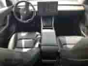 2020 Tesla Model Y Long Range with VIN 5YJYGDEE3LF026592, listed as a Copart auction lot 66036494 with 79,413 mi miles and Salvage title. Bid and sale history available at DreamBid. Image 8.