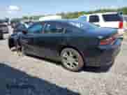 2015 Dodge Charger SE with VIN 2C3CDXFG0FH717148, listed as a Copart auction lot 66098645 with 128,637 mi miles and Salvage title. Bid and sale history available at DreamBid. Image 2.