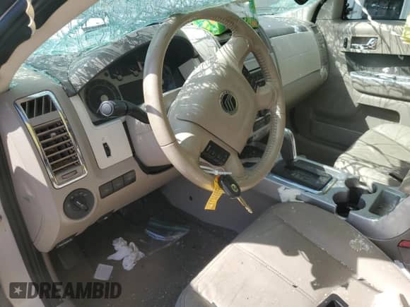 2009 Mercury Mariner Premier with VIN 4M2CU87799KJ04016, listed as a Copart auction lot 84371425 with Not provided miles and Salvage title. Bid and sale history available at DreamBid. Image 8.