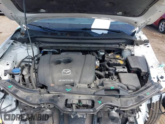 2022 Mazda CX-5 S Select z VIN JM3KFBBM5N0598278, wystawiony jako IAAI lot #42967602 z przebiegiem 26 412 mil mil oraz . Historia ofert i sprzedaży dostępna na DreamBid. Obrazek 10.