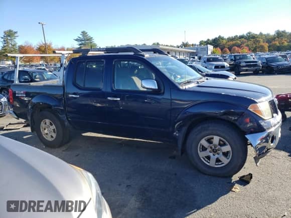 2006 Nissan Frontier SE with VIN 1N6AD07W86C401240, listed as a Copart auction lot 87023625 with 252,639 mi miles and Salvage title. Bid and sale history available at DreamBid. Image 4.