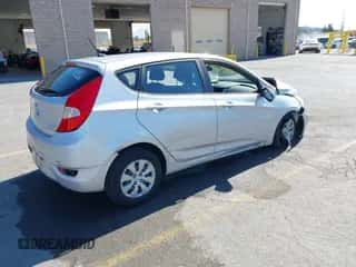 2015 Hyundai Accent GS z VIN KMHCT5AE4FU206771, wystawiony jako IAAI lot #43200865 z przebiegiem 77 934 mil mil oraz . Historia ofert i sprzedaży dostępna na DreamBid. Obrazek 4.