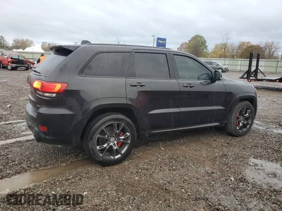 2016 Jeep Grand Cherokee SRT с VIN 1C4RJFDJXGC343157, выставлен на аукционе Copart как лот 89439415 с пробегом 76 190 миль миль и Списание • Salvage title. История ставок и продаж доступна на DreamBid. Изображение 3.