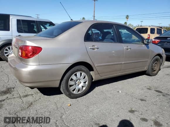 2004 Toyota Corolla CE z VIN 1NXBR32E94Z301126, wystawiony jako Copart lot #87467835 z przebiegiem 181 189 mil mil oraz Szkoda całkowita • Salvage title. Historia ofert i sprzedaży dostępna na DreamBid. Obrazek 3.