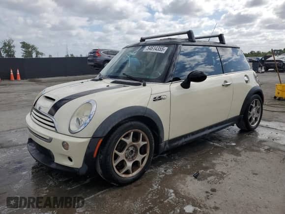 2006 MINI Hardtop S with VIN WMWRE33506TL19646, listed as a Copart auction lot 54614355 with Not provided miles and Salvage title. Bid and sale history available at DreamBid. Image 1.