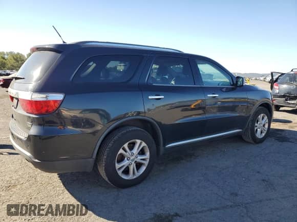 2013 Dodge Durango Crew with VIN 1C4RDJDG4DC700942, listed as a Copart auction lot 84470185 with 219,098 mi miles and Clean title. Bid and sale history available at DreamBid. Image 3.