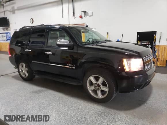 2012 Chevrolet Tahoe LTZ z VIN 1GNSCCE04CR236233, wystawiony jako Copart lot #59973195 z przebiegiem 140 105 mil mil oraz Czysty tytuł • Clean title. Historia ofert i sprzedaży dostępna na DreamBid. Obrazek 4.