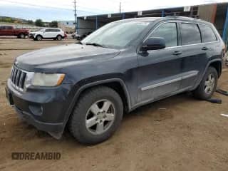 2012 Jeep Grand Cherokee Laredo z VIN 1C4RJFAG5CC202791, wystawiony jako Copart lot #86040175 z przebiegiem 206 265 mil mil oraz Szkoda całkowita • Salvage title. Historia ofert i sprzedaży dostępna na DreamBid. Obrazek 1.