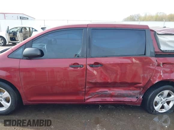 2013 Toyota Sienna L with VIN 5TDZK3DC1DS325363, listed as a IAAI auction lot 42049939 with 209,312 mi miles and . Bid and sale history available at DreamBid. Image 14.