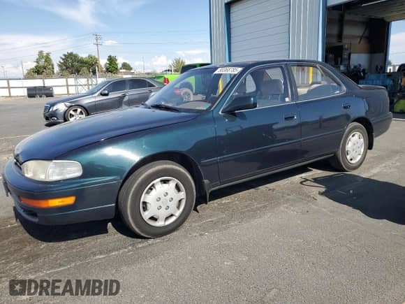 1994 Toyota Camry LE z VIN JT2SK12E7R0246857, wystawiony jako Copart lot #80368785 z przebiegiem 158 559 mil mil oraz Szkoda całkowita • Salvage title. Historia ofert i sprzedaży dostępna na DreamBid. Obrazek 1.