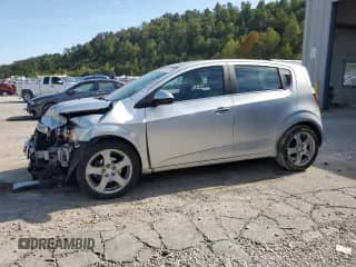 2016 Chevrolet Sonic LTZ with VIN 1G1JE6SB0G4151214, listed as a Copart auction lot 80137935 with 88,660 mi miles and Salvage title. Bid and sale history available at DreamBid. Image 1.