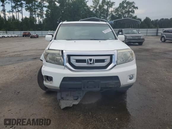 2010 Honda Pilot Touring with VIN 5FNYF4H82AB029490, listed as a Copart auction lot 67353785 with 205,064 mi miles and Salvage title. Bid and sale history available at DreamBid. Image 5.