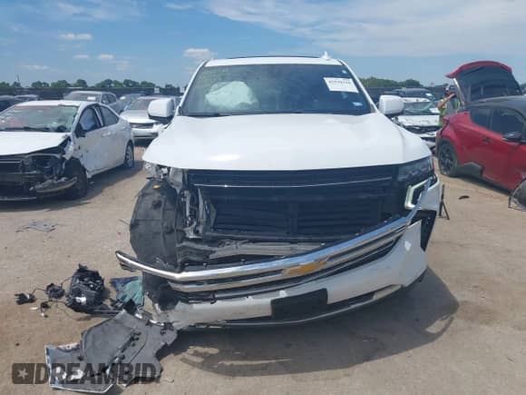 2022 Chevrolet Tahoe LT with VIN 1GNSCNKD2NR130367, listed as a IAAI auction lot 42830210 with 102,005 mi miles and . Bid and sale history available at DreamBid. Image 6.
