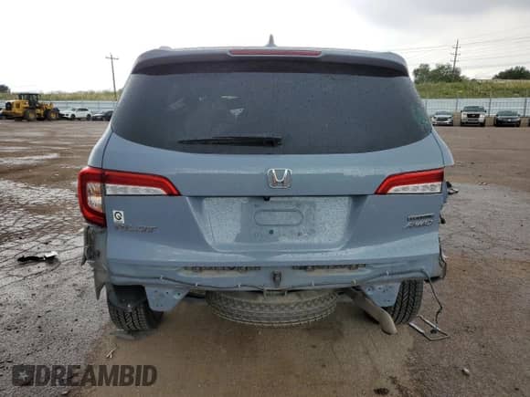 2022 Honda Pilot Touring 7-Passenger with VIN 5FNYF6H60NB042061, listed as a Copart auction lot 64795315 with 49,460 mi miles and Salvage title. Bid and sale history available at DreamBid. Image 6.