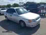 2002 Hyundai Accent GL z VIN KMHCG45C82U268756, wystawiony jako IAAI lot #41569829 z przebiegiem 89 752 mil mil oraz . Historia ofert i sprzedaży dostępna na DreamBid. Obrazek 1.