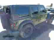 2022 Jeep Wrangler Unlimited Sport with VIN 1C4HJXDG5NW113205, listed as a IAAI auction lot 41836171 with 30,446 mi miles and . Bid and sale history available at DreamBid. Image 4.