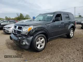 2010 Dodge Nitro SE with VIN 1D4PT2GK1AW134610, listed as a Copart auction lot 57628605 with 89,948 mi miles and Salvage title. Bid and sale history available at DreamBid. Image 1.