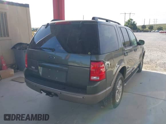 2003 Ford Explorer Eddie Bauer z VIN 1FMZU74K73UC35309, wystawiony jako IAAI lot #41565422 z przebiegiem 100 990 mil mil oraz . Historia ofert i sprzedaży dostępna na DreamBid. Obrazek 4.