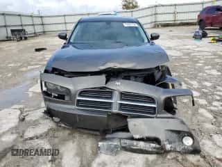 2010 Dodge Charger SXT с VIN 2B3CA3CV7AH234072, выставлен на аукционе Copart как лот 72897734 с пробегом 204 854 миль миль и Списание • Salvage title. История ставок и продаж доступна на DreamBid. Изображение 5.