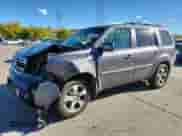 2014 Honda Pilot EX-L z VIN 5FNYF4H55EB054900, wystawiony jako Copart lot #82346645 z przebiegiem 158 454 mil mil oraz Szkoda całkowita • Salvage title. Historia ofert i sprzedaży dostępna na DreamBid. Obrazek 1.