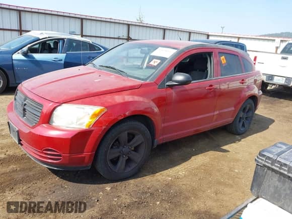 2010 Dodge Caliber SXT with VIN 1B3CB4HA0AD533554, listed as a IAAI auction lot 43128637 with 135,842 mi miles and . Bid and sale history available at DreamBid. Image 2.