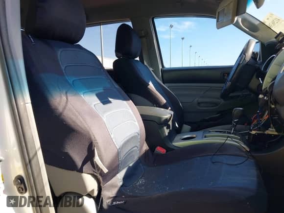 2013 Toyota Tacoma PreRunner with VIN 3TMKU4HN8DM038566, listed as a IAAI auction lot 41296386 with 153,240 mi miles and . Bid and sale history available at DreamBid. Image 5.