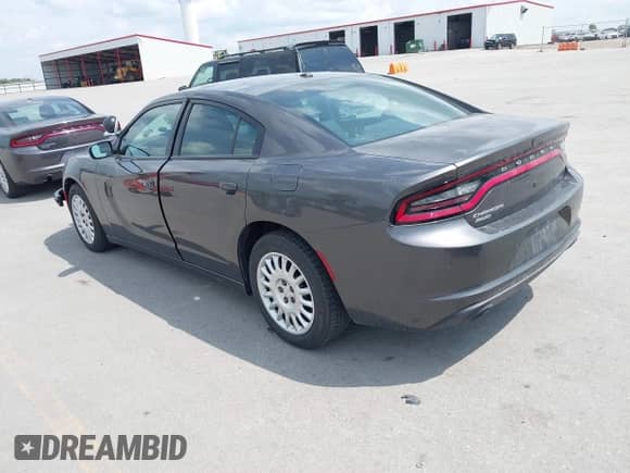 2020 Dodge Charger Police z VIN 2C3CDXKT4LH127498, wystawiony jako IAAI lot #42507194 z przebiegiem 126 145 mil mil oraz . Historia ofert i sprzedaży dostępna na DreamBid. Obrazek 3.