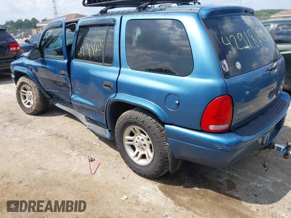 2003 Dodge Durango SLT z VIN 1D4HS48N53F629861, wystawiony jako IAAI lot #42913005 z przebiegiem 165 514 mil mil oraz . Historia ofert i sprzedaży dostępna na DreamBid. Obrazek 3.