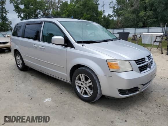 2010 Dodge Grand Caravan SXT with VIN 2D4RN5DX3AR302485, listed as a Copart auction lot 63329625 with 190,456 mi miles and Salvage title. Bid and sale history available at DreamBid. Image 4.