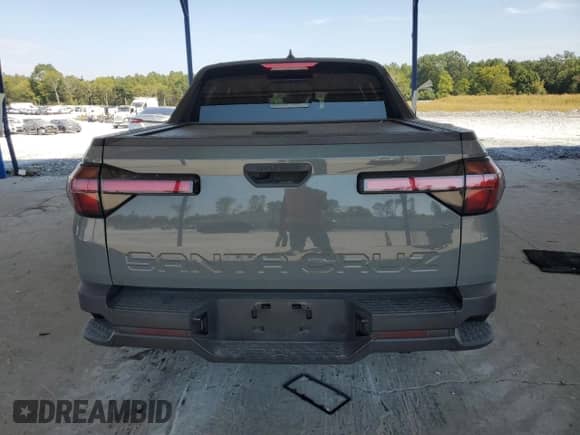 2022 Hyundai Santa Cruz SEL Premium with VIN 5NTJDDAF7NH021572, listed as a Copart auction lot 80869365 with 41,604 mi miles and Salvage title. Bid and sale history available at DreamBid. Image 6.