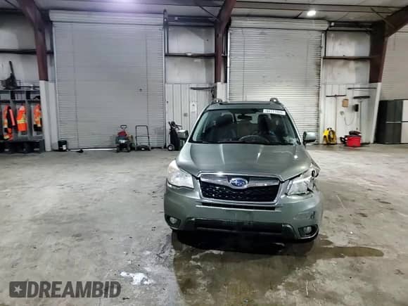 2014 Subaru Forester Limited z VIN JF2SJAJC4EH469915, wystawiony jako Copart lot #82171955 z przebiegiem 169 460 mil mil oraz Szkoda całkowita • Salvage title. Historia ofert i sprzedaży dostępna na DreamBid. Obrazek 14.
