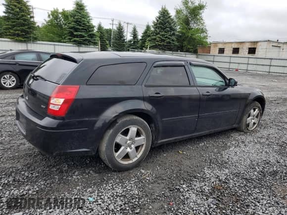 2005 Dodge Magnum SXT with VIN 2D4GZ48V85H576310, listed as a Copart auction lot 61059975 with 175,541 mi miles and Salvage title. Bid and sale history available at DreamBid. Image 3.