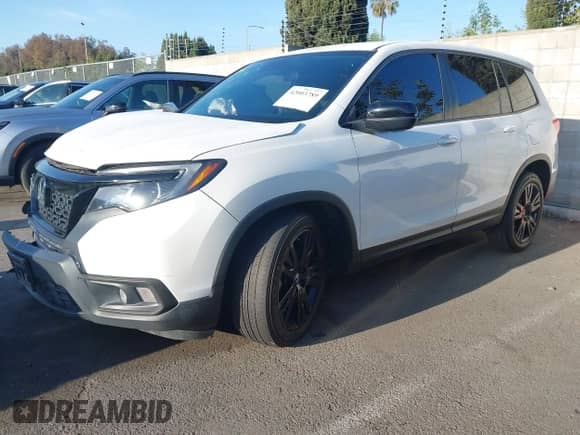 2021 Honda Passport Sport z VIN 5FNYF7H27MB005557, wystawiony jako IAAI lot #42003789 z przebiegiem 120 151 mil mil oraz . Historia ofert i sprzedaży dostępna na DreamBid. Obrazek 2.