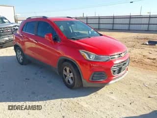 2018 Chevrolet Trax LT z VIN 3GNCJLSB5JL252266, wystawiony jako IAAI lot #43095147 z przebiegiem 129 445 mil mil oraz . Historia ofert i sprzedaży dostępna na DreamBid. Obrazek 1.