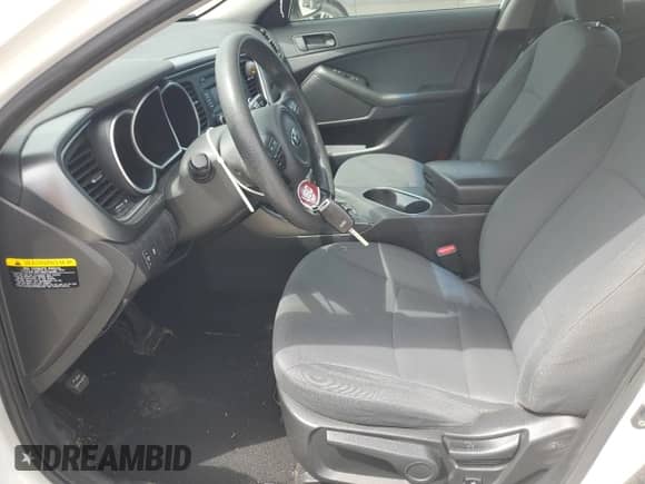 2015 Kia Optima LX with VIN KNAGM4A79F5630761, listed as a Copart auction lot 70302334 with 106,427 mi miles and Salvage title. Bid and sale history available at DreamBid. Image 7.