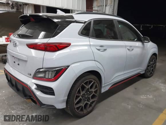 2023 Hyundai Kona with VIN KM8KH3AC9PU009337, listed as a IAAI auction lot 42827068 with 40,513 mi miles and . Bid and sale history available at DreamBid. Image 4.